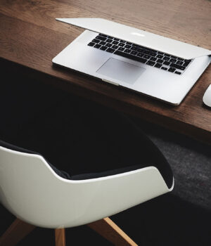 The hand rail is going a little faster than the moving sidewalk.